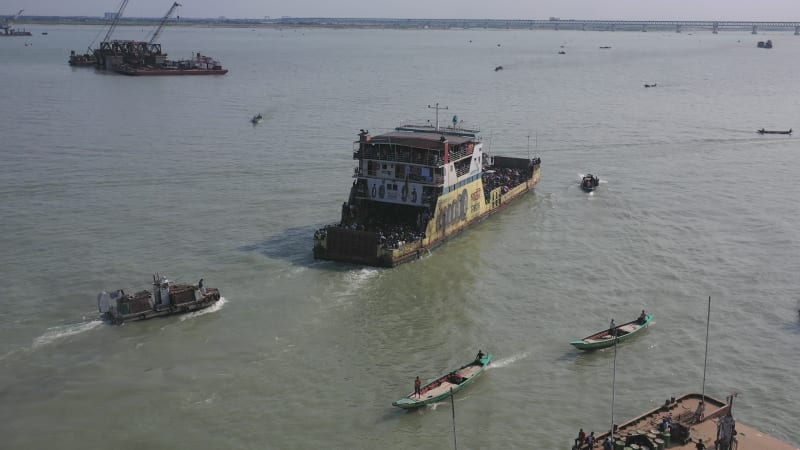 Aerial view of a ferry boat crossing the Padma River, Bangladesh.