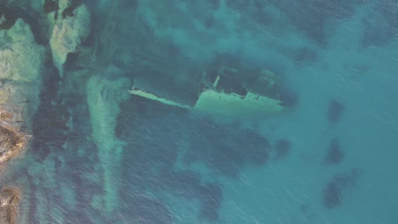 Aerial view of a sunken shipwreck in Pomonte, Elba Island, Tuscany, Italy.