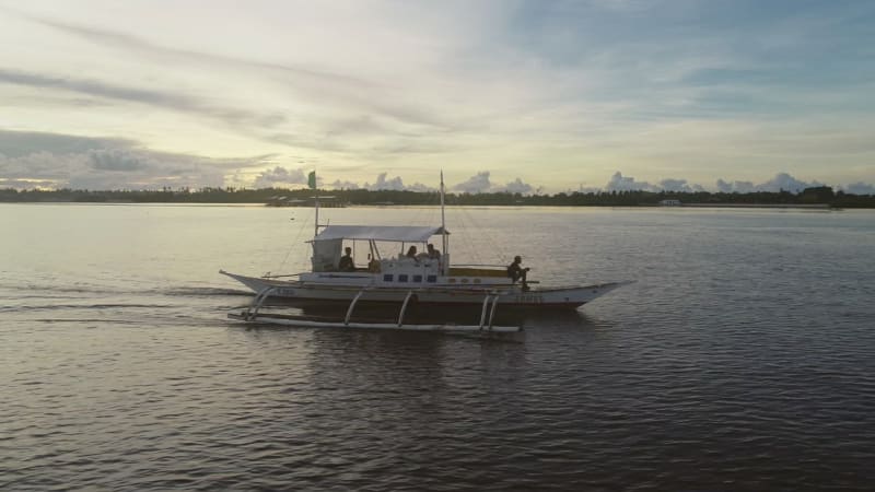 Aerial view of single filipino fishing boat near Lapu-Lapu city.