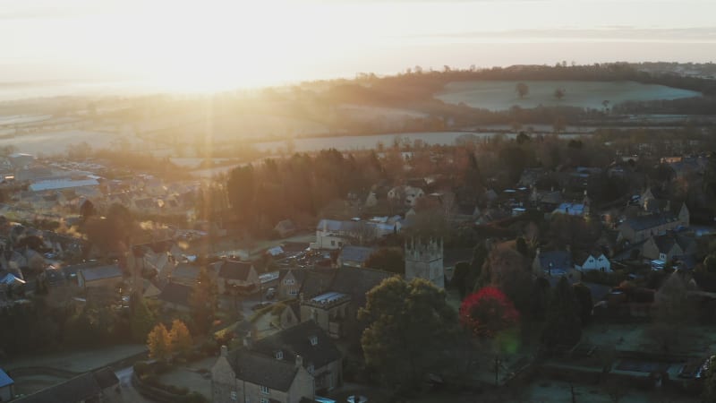 Typical English village and beautiful British countryside scenery in The Cotswolds showing a rural church at sunrise in beautiful morning light at Longborough, Gloucestershire, England, UK