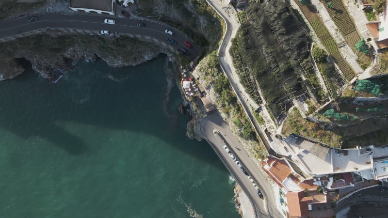 Aerial view of vehicles driving on the Amalfi drive, Salerno, Italy.