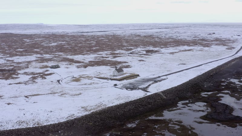 Secluded Church in Snowy Iceland on the Coast