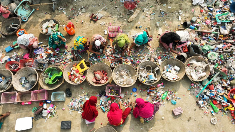 Aerial View of people working in a plastic Waste treatment plant, Bangladesh.