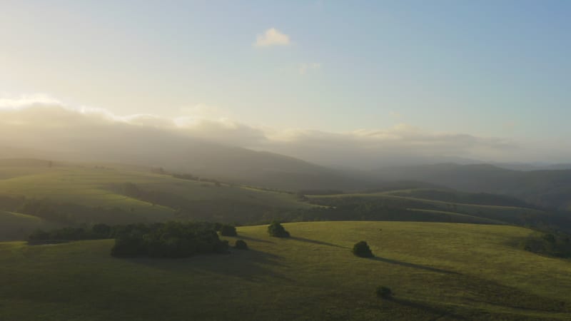 Flying over South African hills with a dream like feel