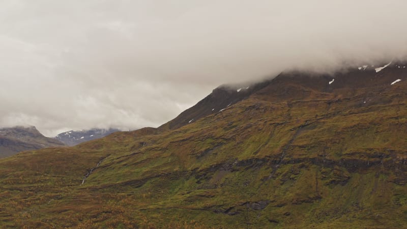 Mossy mountain on a cloudy day in Norway.