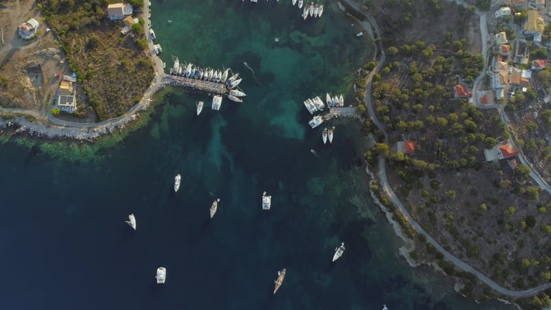 Aerial view of group of boats anchored in the mediterranean sea.