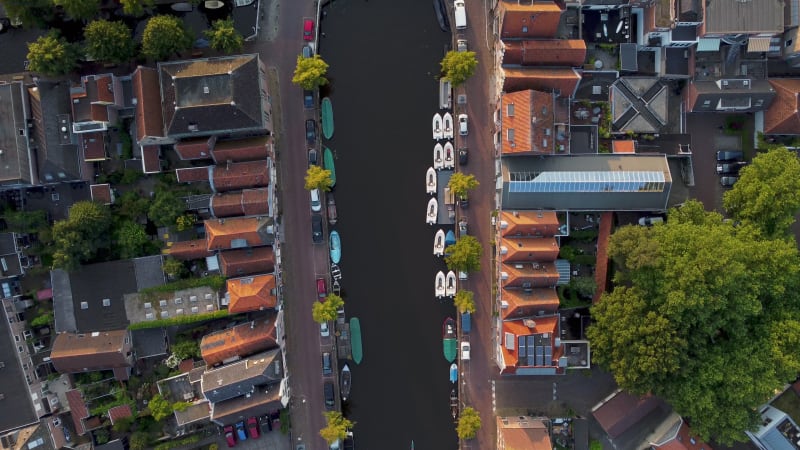 Bird's eye view of a water canal and houses in Alkmaar, North Holland Province, Netherlands.