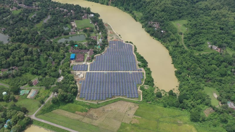 Aerial view of solar panels along Karnaphuli river, Bangladesh.