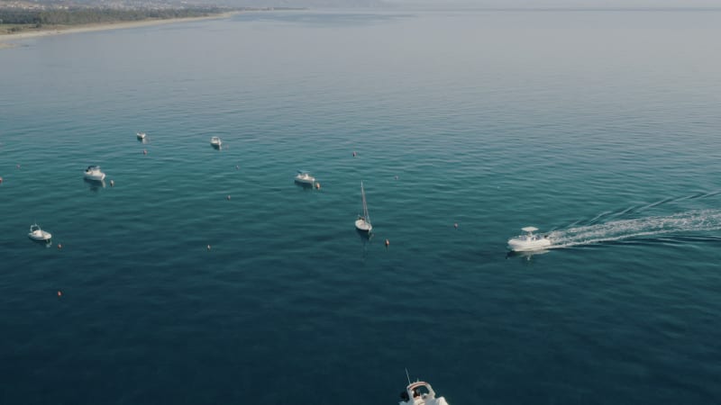 Aerial view of speedboats in the Ionian Sea, Calabria, Italy.