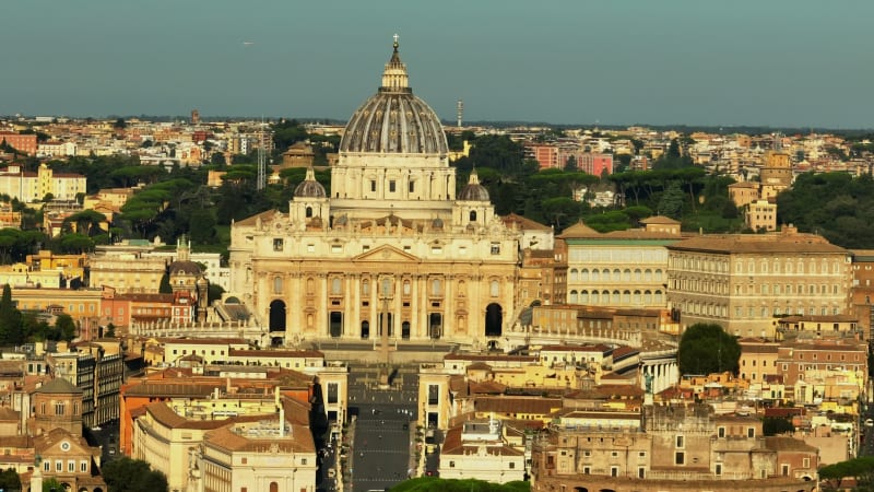 Zoomed shot of majestic St. Peters Basilica and square in Vatican City. Famous Italian landmark. Rome, Italy