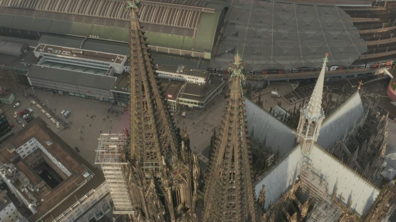 High angle shot of gothic style Cathedral Church of Saint Peter and surrounding buildings. Cologne, Germany