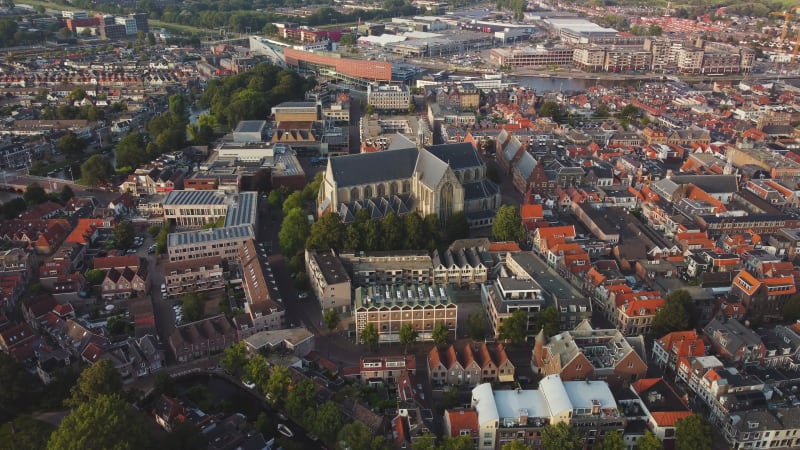 Grote or St. Laurentiuskerk and houses in Alkmaar City, North Holland Province, Netherlands.