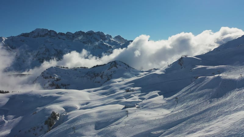 Aerial view of people during the ski season in winter, French Alps, France.