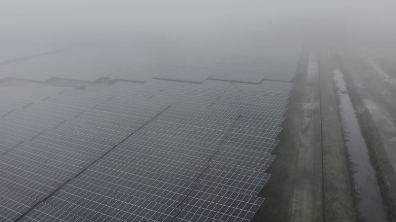 PV panels side shot high up in the fog Almelo Netherlands