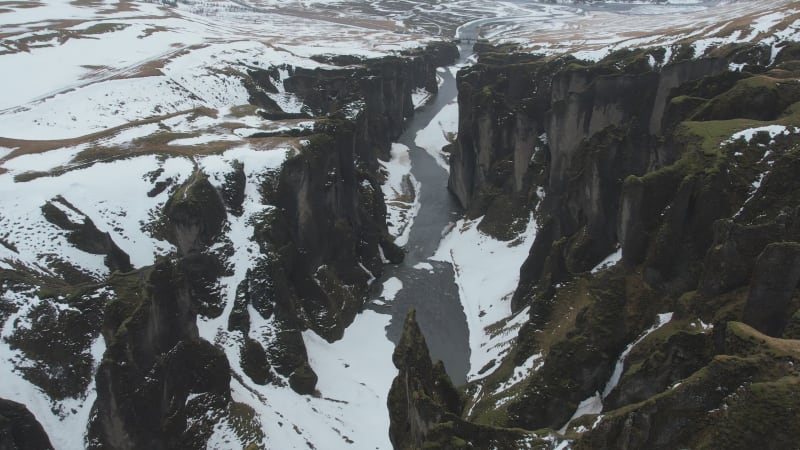 Aerial view of Fjardarargljufur canyon with river in wintertime, Iceland.