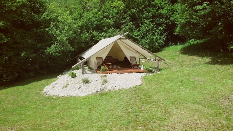 Tracking shot of a glamping tent in an eco camping.