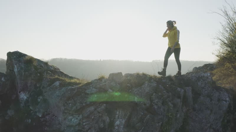 Aerial view of a woman on the rocks, Dinant, Namur, Belgium.