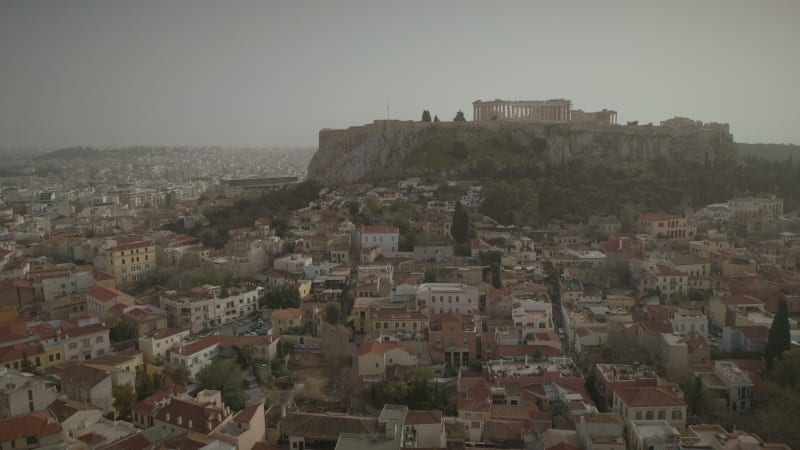 Aerial view of the parthenon temple on acropolis hill and the skyline.