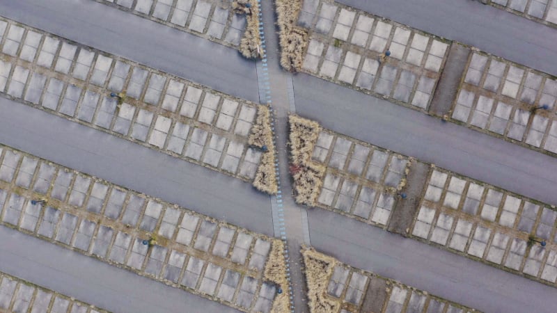 Rotating aerial view of abandoned parking lot