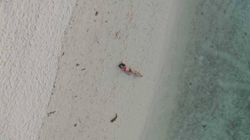 Aerial view of a person on the beach, Mauritius.