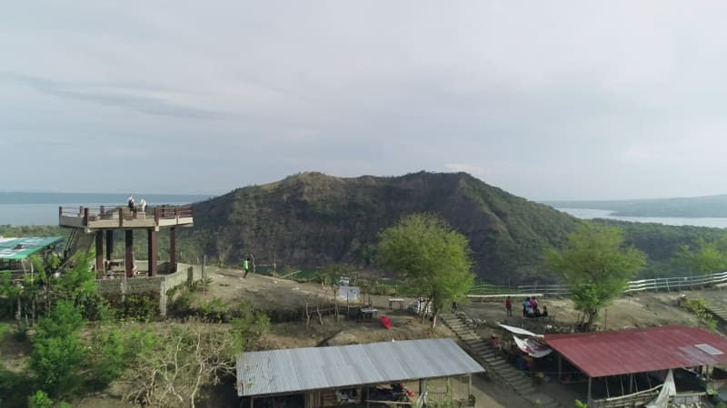 Aerial view of observation point of tall volcanic lake in Talisay.