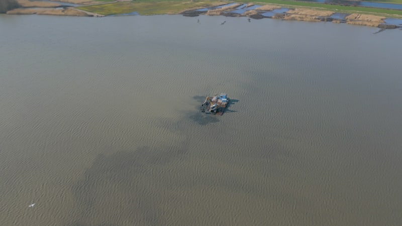 Excavator working in a lake