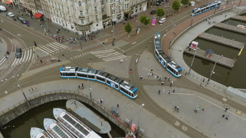 Overhead View of Trams Departing from Amsterdam Central Station