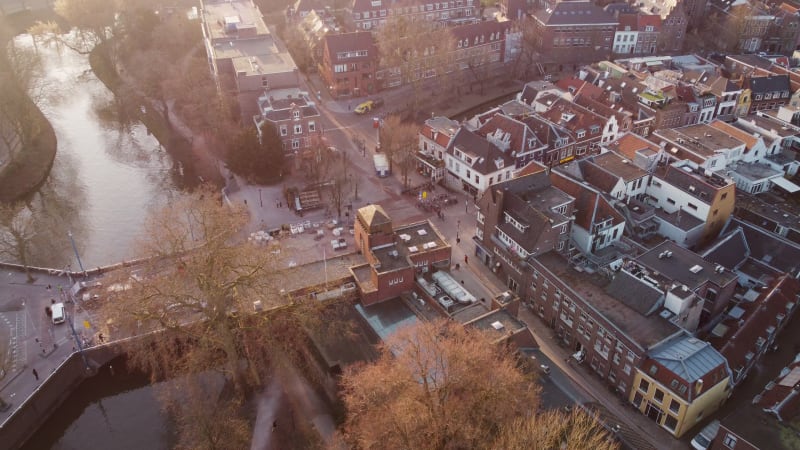 Aerial close up drone footage panning along ledigerf canal at the City center of Utrecht in Netherlands