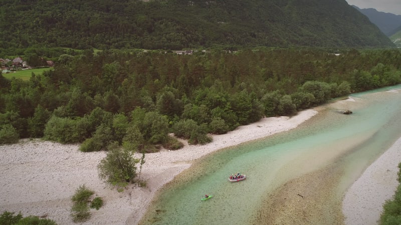 Aerial view of a group of people doing white water rafting.