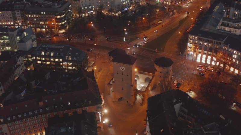 The Famous Isartor City Gate in Munich, Germany from above with little traffic due to coronavirus covid 19 Pandemic lockdown, Aerial Birds Eye View