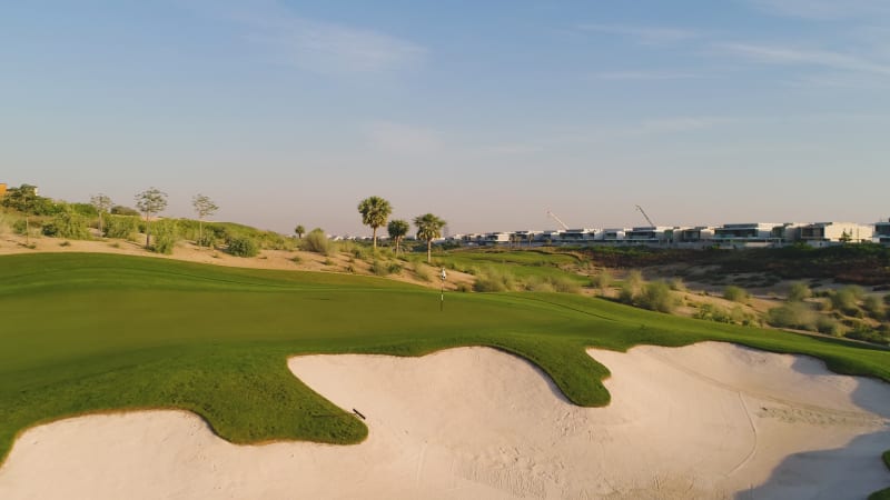 Aerial view of luxury golf club on residential area.