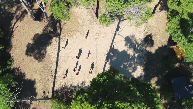 Aerial view of group playing volleyball in Veli Rat bay