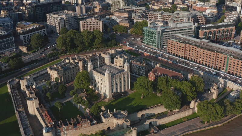 Aerial view of royal castle complex. Medieval keep White Tower with four towers in corners. London, UK