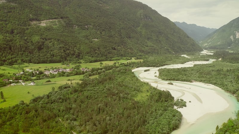 Aerial view of surrounded by a small town and many hills.