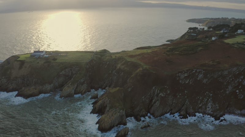 Helipad and Baily Lighthouse on the shore of Dublin, Ireland