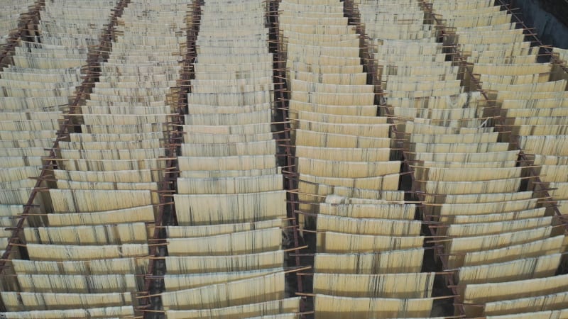 Aerial view of Drying of natural fibers for fabric, Barga, Rajshahi, Bangladesh.