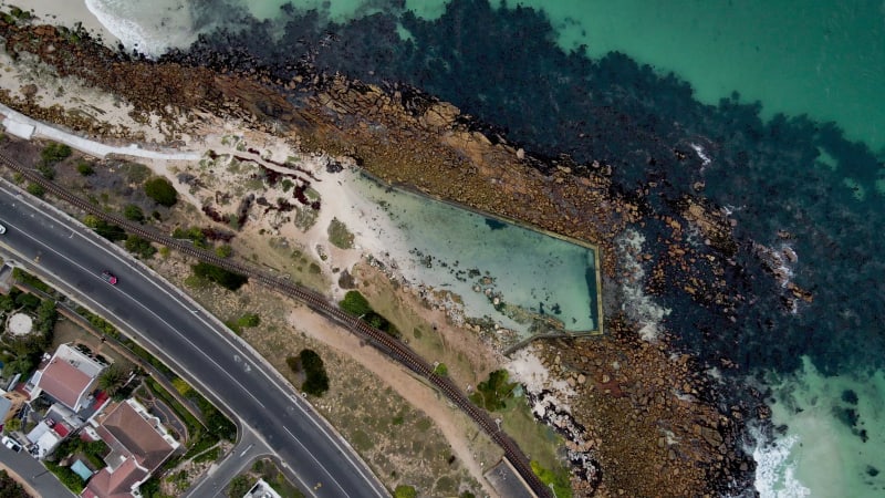 Aerial view of Glencairn tidal pool summer swim, Cape Town, South Africa.