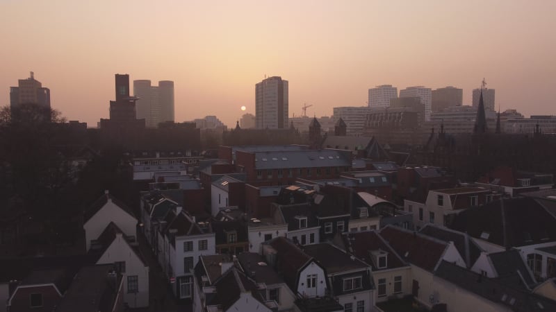 Drone panning shot of a beautiful sunset as seen from the citycenter of Utrecht, Netherlands