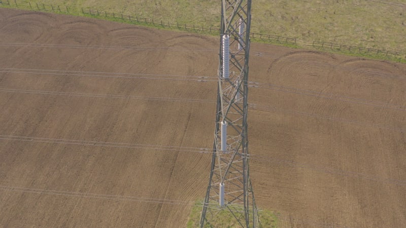 High Voltage Electrical Transmission Pylon Close Up Aerial View