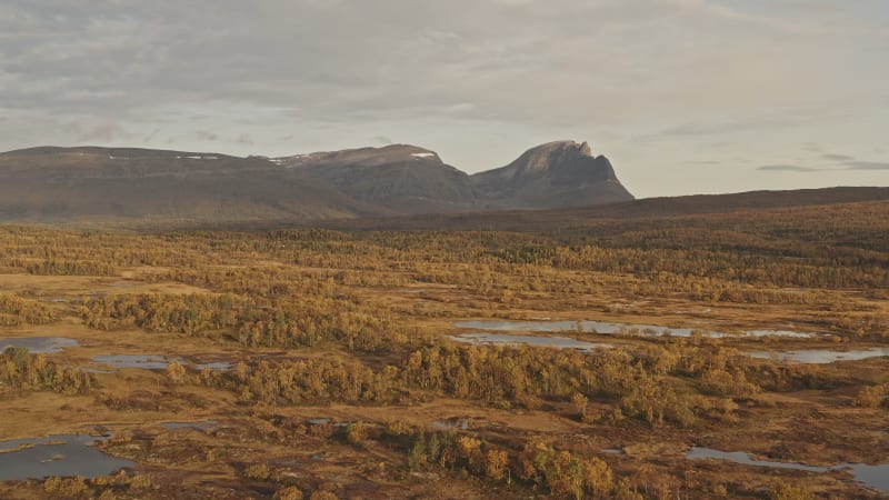 Autumn forest, lakes and mountains in Norway.