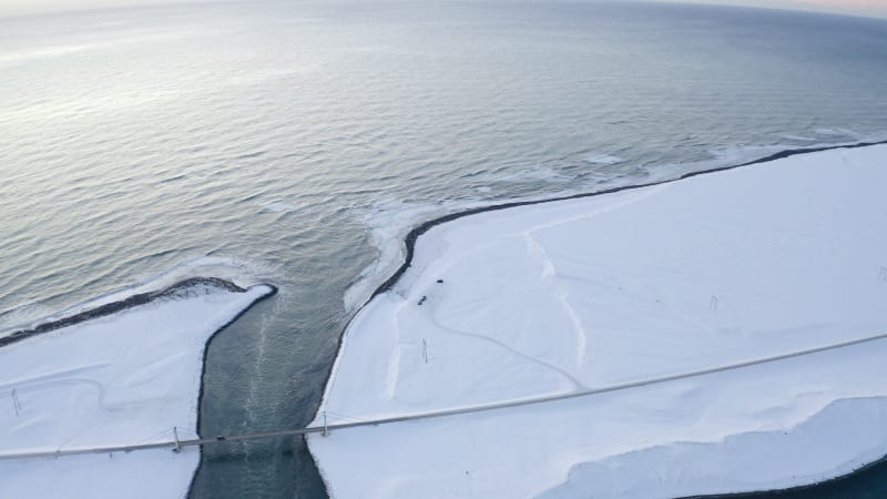 Birdsview of White Snow coast on Black Beach in Iceland Winter, Snow