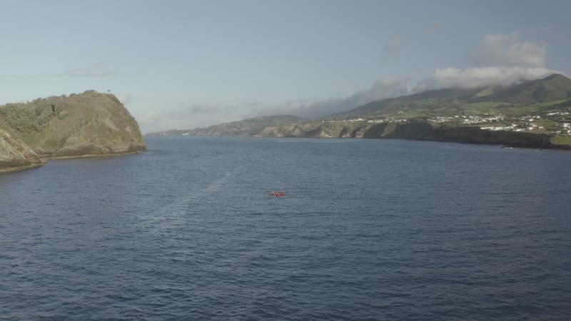 Aerial view of people doing kayak at Ilheu da Vila, Azores, Portugal.