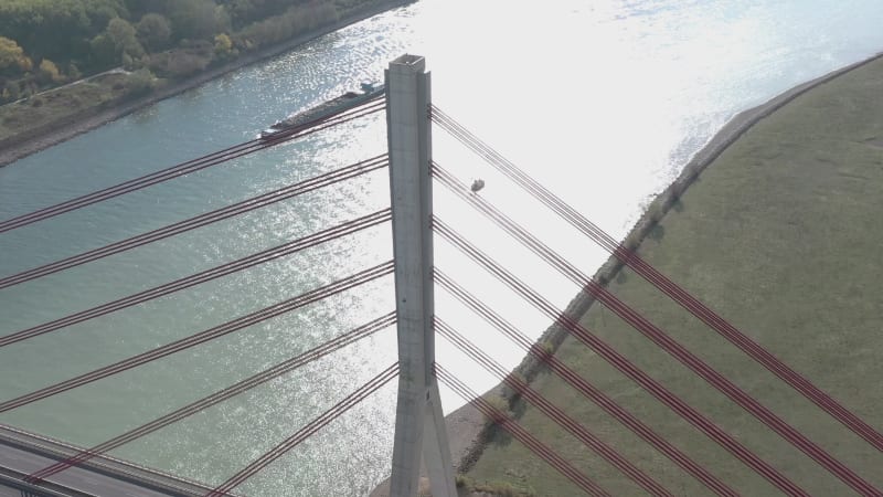 Aerial View of a Cable Stayed Suspension Bridge Crossing a River