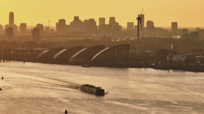 Rotterdam Skyline and Passenger Ship on Nieuwe Maas River Aerial Footage