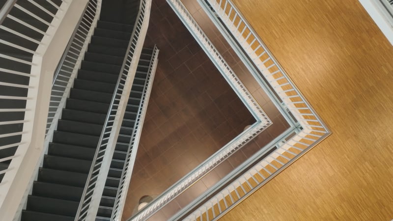 Top down aerial shot of a hallway and escalators at the Galgenwaard stadium at FC Utrecht