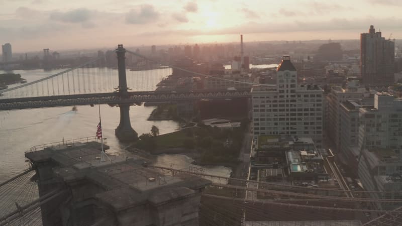 Majestic Brooklyn Bridge at Sunrise Dawn with Brooklyn Neighbourhood and Residential Streets, Aerial View