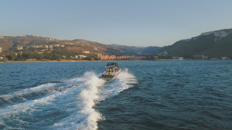 Aerial view of motor boat sailing in the mediterranean sea.