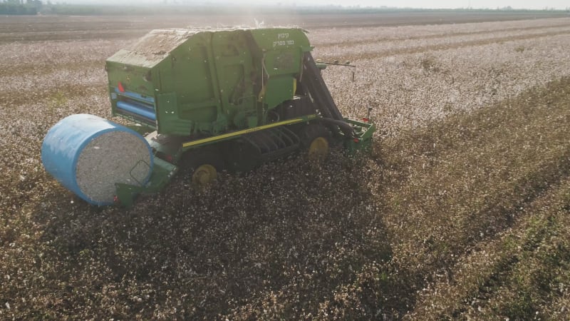 Aerial view of combine picking cotton, Kibbutz Saar, Mate Asher, Israel.