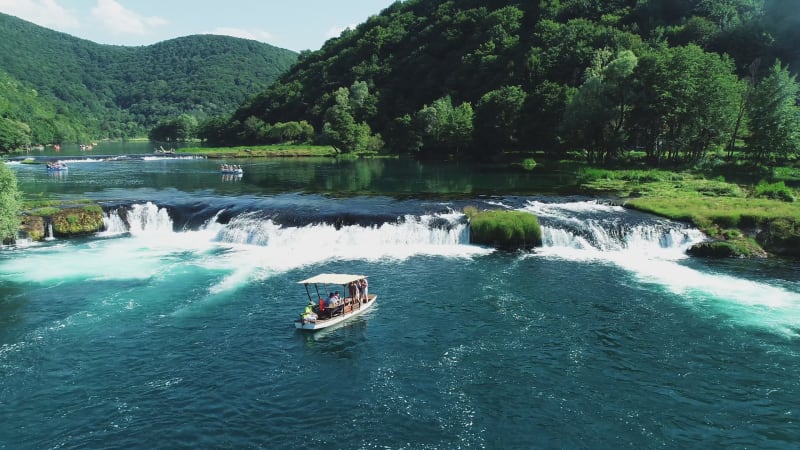 Aerial view of a boat sailing the Una River, Croatia.