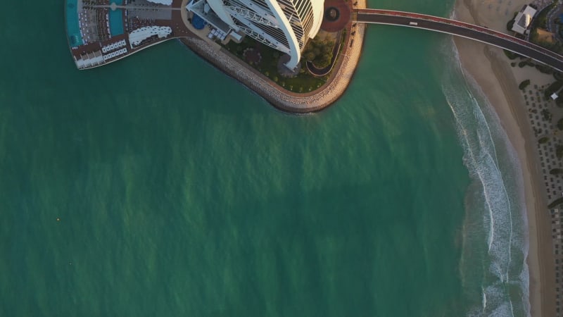 Aerial view above of the luxury Burj Al Arab hotel.